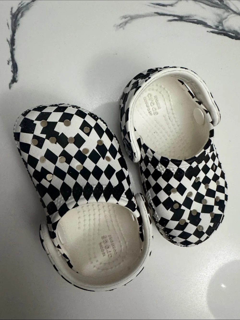 CROCS Kids Checkerboard Slip-On Clogs in Black and White